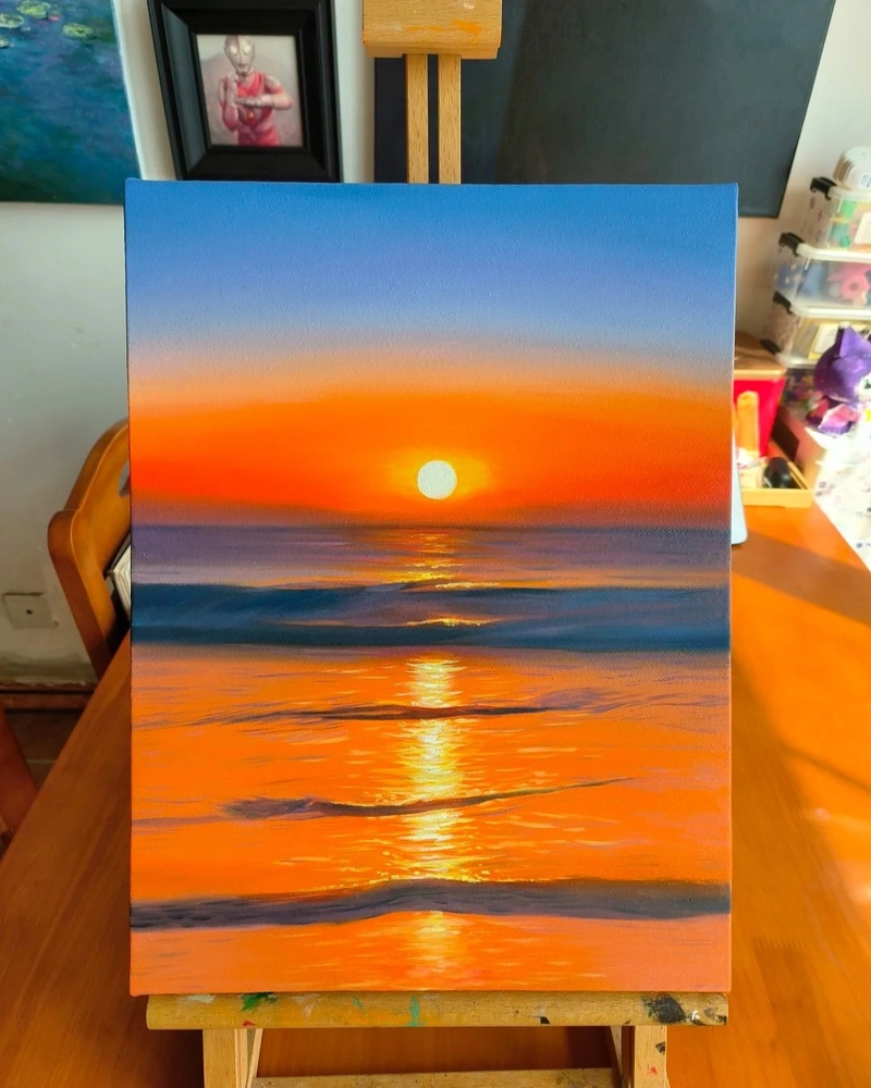 Vẽ tranh ông mặt trời mọc trên biển xanh yên bình