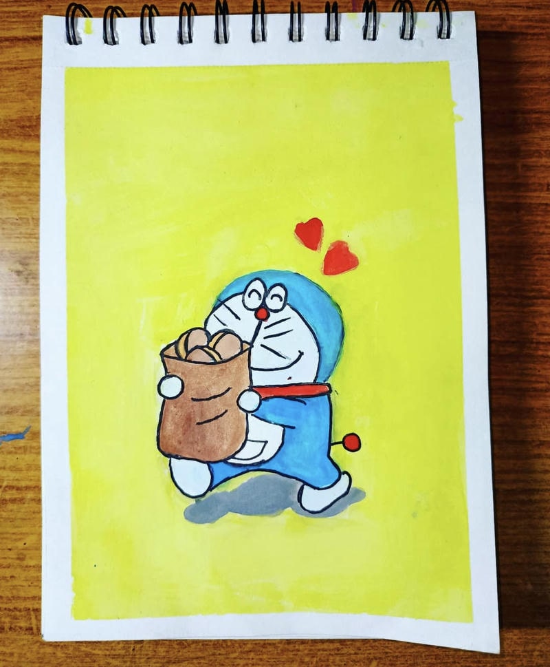 tranh vẽ doremon đang ăn bánh rán