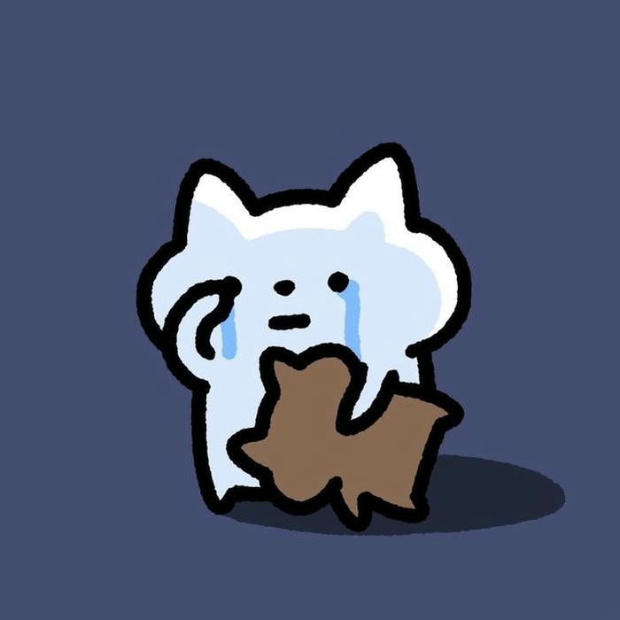 Meme buồn mèo con ôm gấu bông khóc thầm lặng