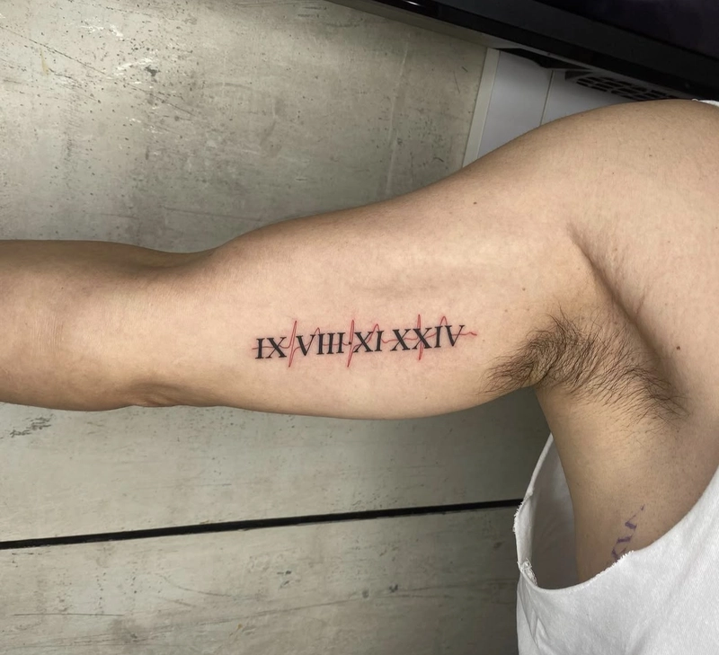 hình xăm la mã ở bắp tay