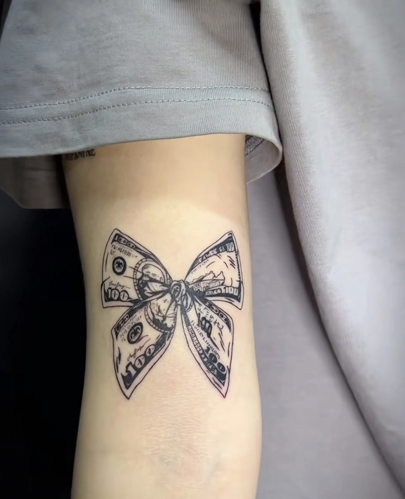 hình xăm tờ tiền đô cho nữ