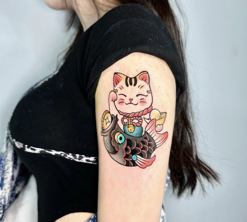 xăm hình mèo thần tài