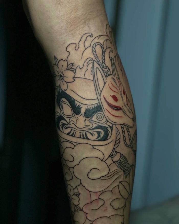 Mẫu xăm Daruma nét mảnh chưa tô màu ở tay