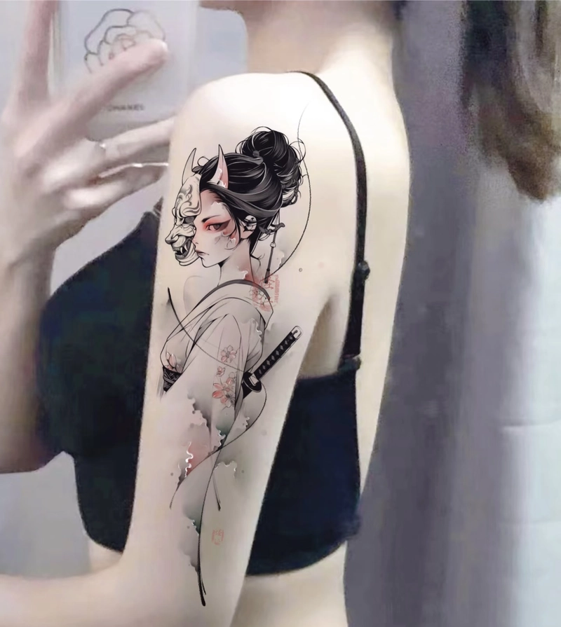 hình xăm cô gái nhật bản và mặt quỷ