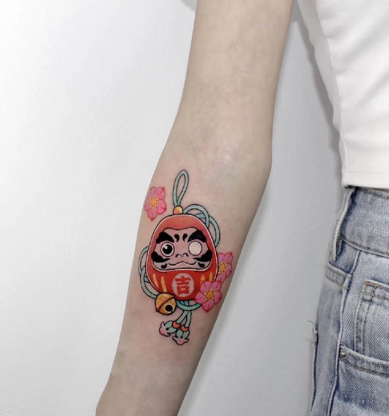 hình xăm daruma cho nữ