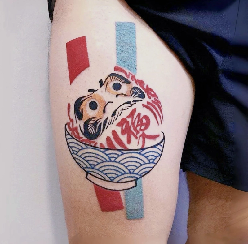 hình xăm mặt quỷ daruma
