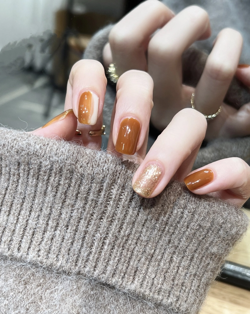 mẫu nail màu cam nâu cực đẹp