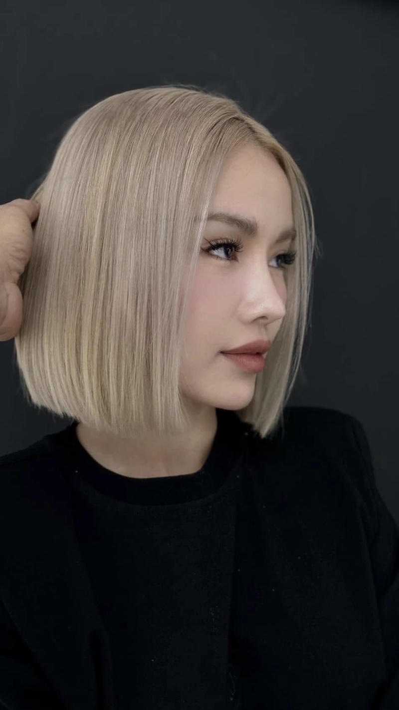 tóc xoăn ngắn cho mặt tròn dài