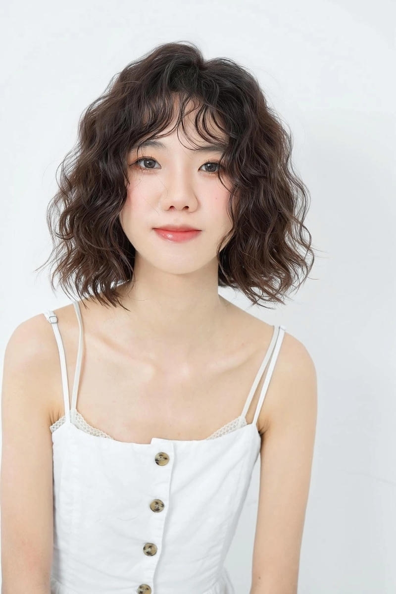 tóc xoăn sóng lơi mái bằng