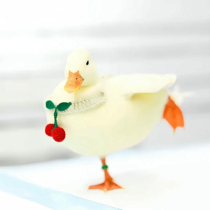 Avatar vịt cute vịt trắng đứng cạnh quả anh đào