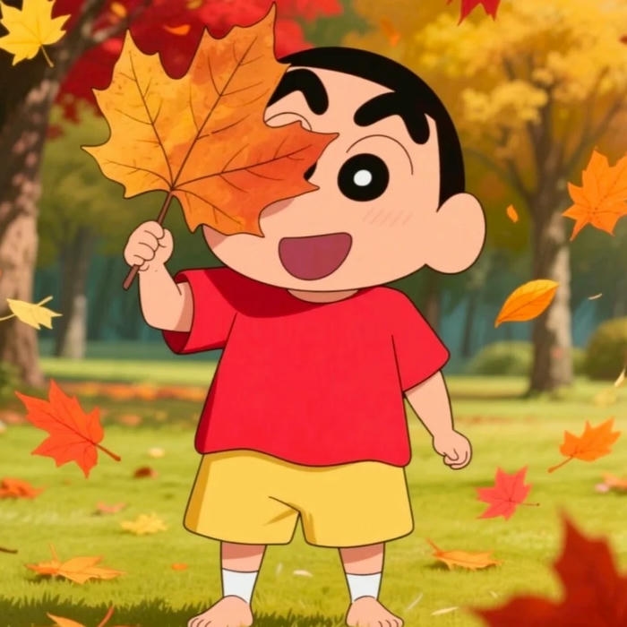 Ảnh Shin hài hước cầm lá phong mùa thu rực rỡ